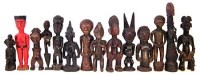 Lot 243 - Fourteen African figures carved in various tribal