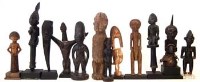 Lot 244 - Twelve African figures carved in various tribal