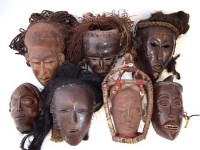 Lot 245 - Seven Masks carved in Chokwe and similar tribal