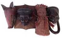 Lot 247 - Four Chokwe masks, the largest measures 38cm high