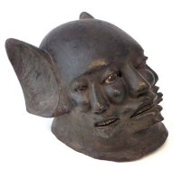 Lot 258 - Makonde three face mask, 18cm high      All lots