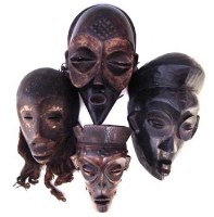 Lot 264 - Chokwe mask, Lega mask and two Lulua masks, the