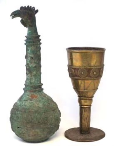 Lot 280 - Brass or Bronze bird head ritual vessel probably