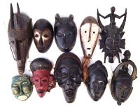 Lot 283 - Ten masks carved in various tribal styles, the