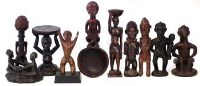 Lot 287 - Seven figure, a small stool, a spoon and figure