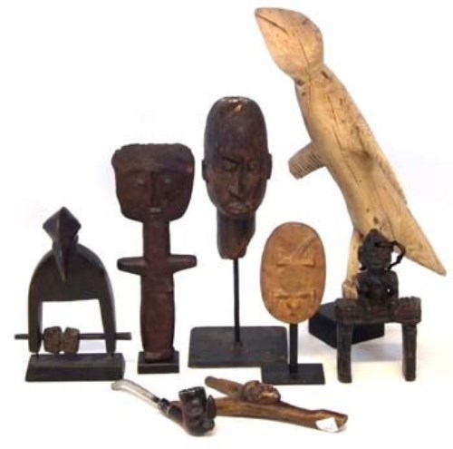 Lot 291 - Collection of items, to include a Dogon head, a small panel carved with an aligator, an Asante doll, Lobi slingshot, Ya