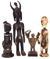 Lot 293 - Two Dogon figures, one with heavy encrusted