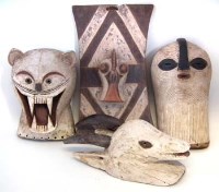 Lot 297 - Luba Leopard mask also a Songye animal mask, a Kifwebe mask and a cockerel plaque, the plaque measures 52cm high