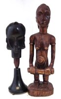 Lot 301 - Fang head and one other figure, 64cm high     All