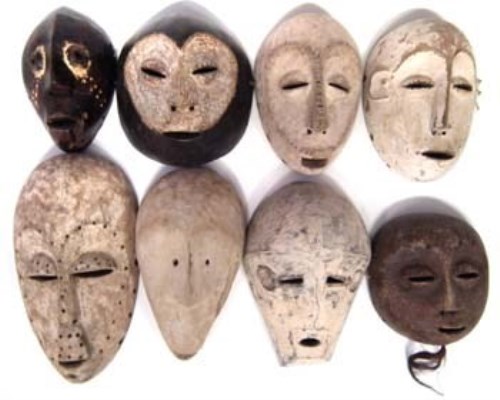 Lot 7 - Eight African masks carved in various tribal