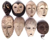 Lot 7 - Eight African masks carved in various tribal