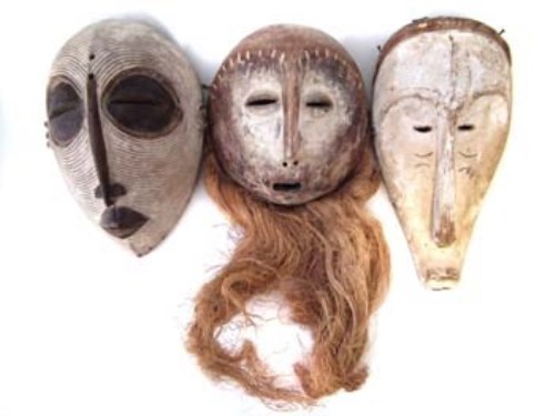 Lot 10 - Fang mask, Lega mask, and a Luba mask.