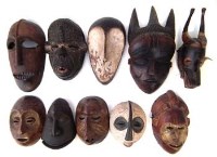 Lot 13 - Ten African masks carved in various tribal