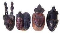 Lot 19 - Baule mask carved with two figures and three