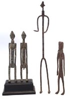 Lot 64 - Bambara iron female figure together with a pair