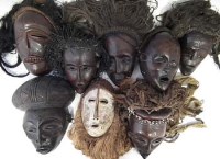Lot 68 - Eight African masks carved in various