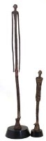 Lot 71 - Two Mali bronze elongated figures similar to
