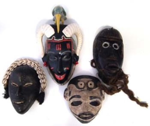 Lot 74 - Two Dan masks, a Guro - Yuare mask and one other