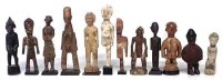 Lot 77 - Twelve African figures carved in various tribal