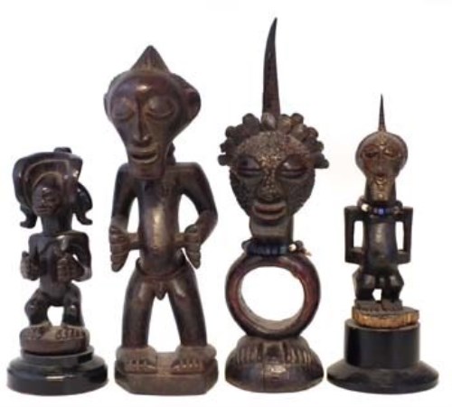 Lot 86 - Three Songye figure and a Chokwe figure, the