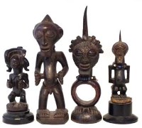 Lot 86 - Three Songye figure and a Chokwe figure, the