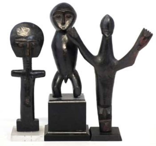 Lot 87 - Asante Akuaba doll, Lega figure and a Mumuye