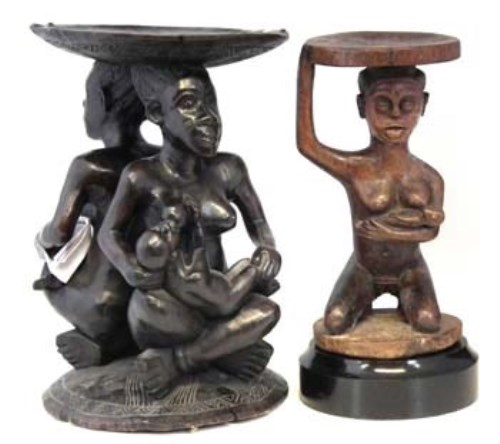Lot 108 - Two Chief’s stools, carved with maternity figures, the largest measures 51cm high