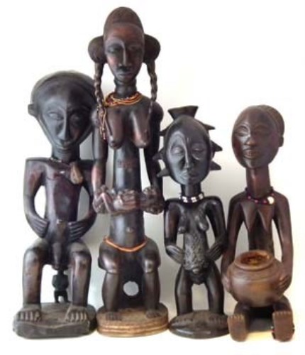 Lot 109 - Four Large Luba / Hemba figures, the tallest All lots in this Tribal and African Art Sale are sold subject to V.A.T. Therefore £100 hammer price will