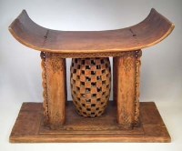 Lot 114 - Ashanti stool, 74cm wide     All lots in this