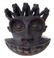Lot 124 - Cameroon Bamileke mask, 43cm high     All lots in