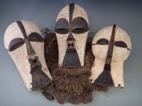 Lot 11 - Three Songye Kifwebe masks, the largest measures