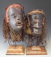 Lot 24 - Two Chokwe masks, the largest measures 27cm high
