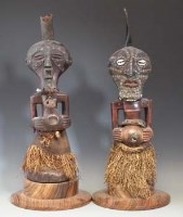 Lot 37 - Two Songye Mankishi Power figure or Fetishes,  the tallest measures cm overall height.