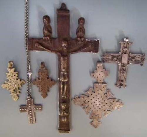 Lot 52 - Kongo brass or bronze Crucifix figure, also five Ethiopian Coptic crosses, (6) the crucifix measures 24cm high