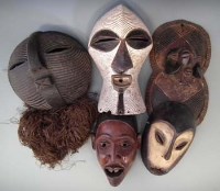 Lot 73 - Songye kifwebe mask, a panel, Yombe mask, Lega