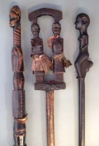 Lot 77 - Mende staff, another staff carved with a pair of