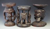 Lot 82 - Three African stools, carved in the Bamileke