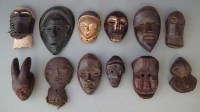 Lot 86 - Twelve African passport masks, the largest