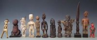 Lot 87 - Twelve African figures, carved in various tribal