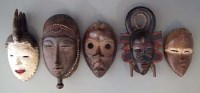 Lot 89 - Five Ivory Coast masks, the largest measures 30cm