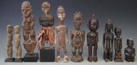Lot 98 - Ten African figures carved in various tribal