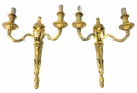 Lot 12 - A pair of late 19th century gilt brass twin branch wall lights
