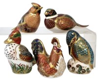 Lot 104 - Five Royal Crown Derby bird paperweights, to