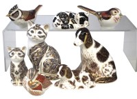 Lot 110 - Eight Royal Crown Derby paperweights, to include