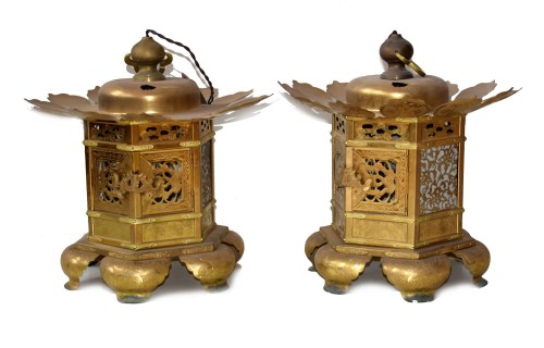Lot 150 - A pair of 20th century Chinese pressed brass pagoda lanterns