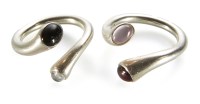 Lot 199 - A pair of Georg Jensen silver stone set rings.