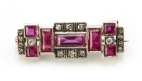 Lot 227 - Art Deco diamond and ruby white gold and platinum brooch