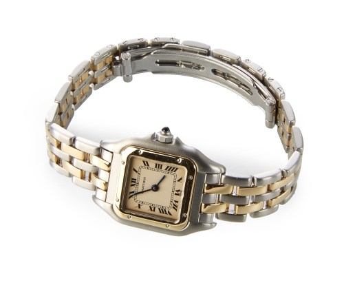 Lot 244 - A lady's Cartier Santos steel and yellow gold bracelet watch