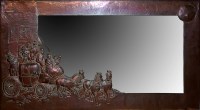 Lot 17 - An embossed copper wall mirror