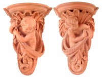 Lot 140 - Pair of Watcombe Pottery Terracotta Wall Shelves
